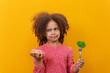 The concept of choosing products for healthy baby food. a carrot-and-stick approach