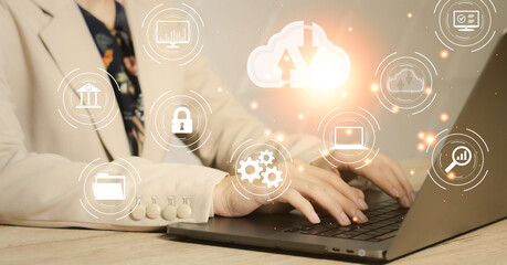 Fototapete - Cloud computing technology and online data storage for business network concept. Businesswoman using laptop computer connects to cloud data.