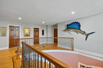 Canvas Print - Modern and well-maintained home features a staircase with banisters and railings in New England