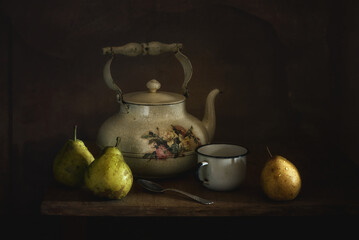 Wall Mural - Still life with an old teapot, a white enamel cup and ripe pears.