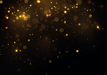 sparks and golden stars shine with special light on a black background. christmas concept bokeh. abs