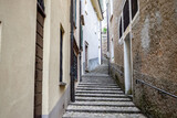 Fototapeta Na drzwi - Morcote, Ticino, Switzerland - May 21, 2022 Narrow streets of  Morcote