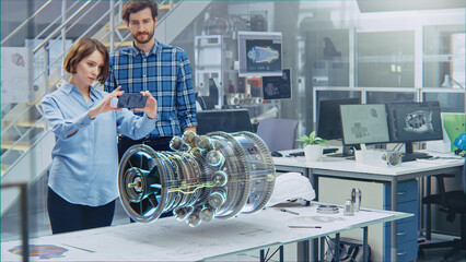 Wall Mural - industry 4.0 facility: female designer with chief engineer use smartphone with augmented reality app
