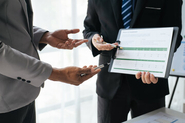 Aufkleber - Cropped shot of professional business team exchanging their investment concept together in the meeting room.