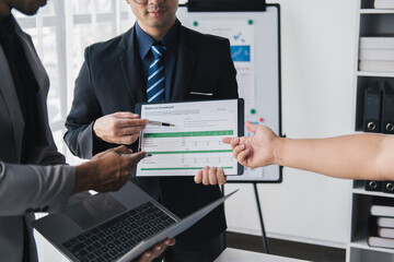 Aufkleber - Cropped shot of professional business team exchanging their investment concept together in the meeting room.