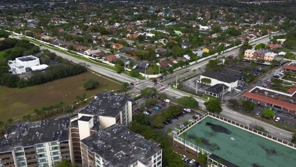 Sticker - Aerial timelapse video of a four-way intersection on a cloudy day in Fort Lauderdale, Florida