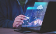 © Montri - businessman uses a Laptop with technology cloud computing for data transmission, database, data storage, and backup. Networking and internet service concept. Cloud service. Cloud Computer technology.