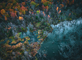 Wall Mural - Wisconsin landscape, river in the colorful autumn forest, drone image