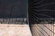 Beach tennis net. Footvolley Network. Copyspace - Horizontal Photo - Black Background