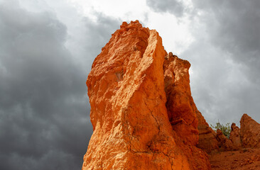 Wall Mural - Hoodoo rock formation at sunset with dramatic thunder storm clouds, Bryce canyon national park, Utah, USA.