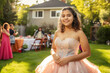 © Trinette Reed - Portrait of Hispanic teenager girl at her quinceanera with family in backyard