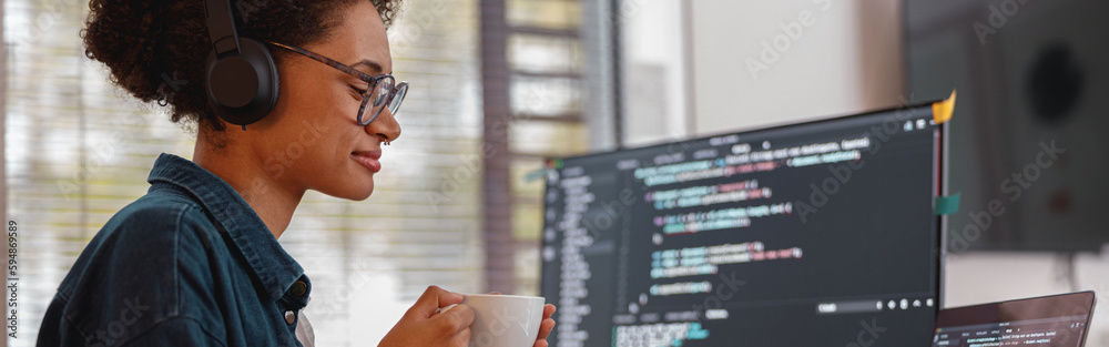 Female freelancer making new project as web designer and programmer on ...