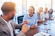 © Joshua A./peopleimages.com - Business people, talking and meeting at desk with man, women or idea for company growth with diversity. Businessman, teamwork or discussion for consulting, planning or advice for strategy in workshop