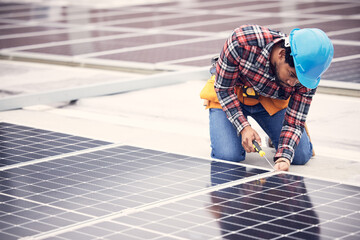 Poster - Black man, electrician and solar panels installation on rooftop, sustainable energy with eco friendly technology. Maintenance, tools and male in engineering with infrastructure and power from the sun