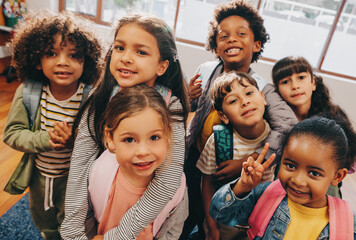 class selfie in an elementary school. kids taking a picture together in a co-ed school