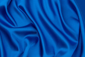 Wall Mural - Blue satin or silk fabric as background