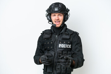 Wall Mural - SWAT man over isolated white background pointing to the front and smiling