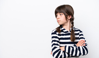 Wall Mural - Little caucasian girl isolated on white background keeping the arms crossed