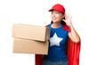 © luismolinero - Super Hero delivery Asian woman holding boxes over isolated background listening to something by putting hand on the ear