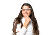 Young girl over isolated chroma key background with glasses and smiling