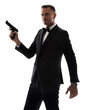 Portrait, gun and man in tuxedo or professional secret service on isolated, transparent or png background. Face, detective and guy agent with firearm and suit in cosplay, halloween or crime aesthetic