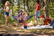 © luckybusiness - camping, tourism and travel concept -  friends  have good time on camping trip