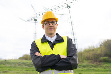 Poster - Engineer on a background of power line tower