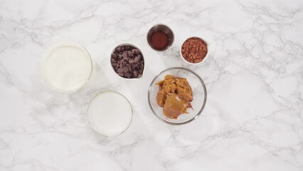 Wall Mural - Flat lay. Ingredients to prepare chocolate ice cream on the counter.