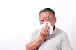 © Pajaros Volando - Senior Asian man sneezing his noose. Sickness, flu, awareness concept. White isolated background. Generative AI