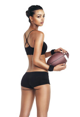 Back portrait, football and training with a woman athlete isolated on a transparent background for serious competition. PNG, exercise and fitness with a sports person holding a ball in challenge