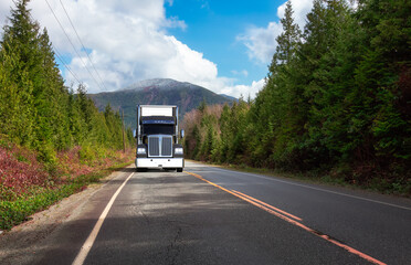 Wall Mural - Commercial Truck Driving on Scenic Road with green Trees and Mountains in Background. 3d Rendering Vehicle. Pacific Rim Hwy to Tofino, Vancouver Island, British Columbia, Canada.