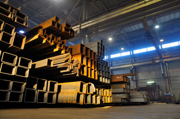 Wall Mural - Storage of rolled metal in the warehouse of the plant.