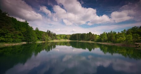 Wall Mural - mountain panorama landscape of a forest and lake, beautiful wood and clear water, park karandila, sl