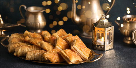 Tasty Turkish baklava on dark background