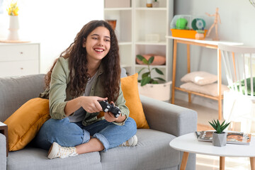Poster - Teenage girl playing video game at home