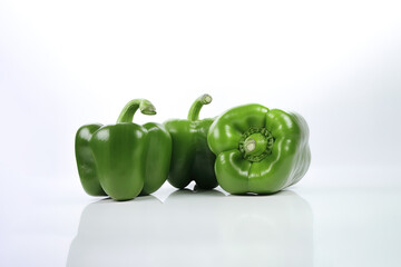 Wall Mural - a group of green bell pepper isolated on white background. Created with Generative AI Technology