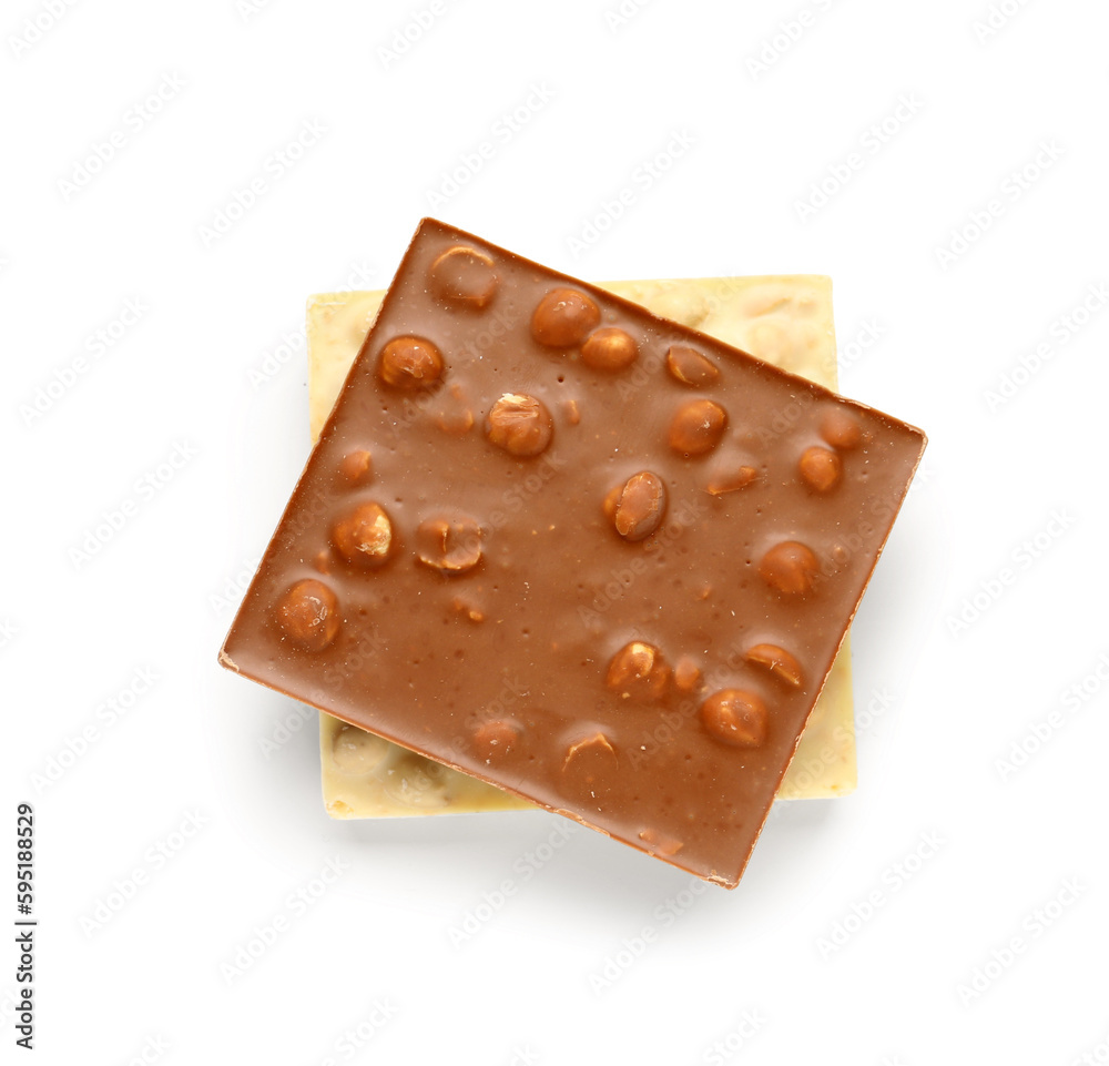 Different sweet chocolate with nuts on  white background