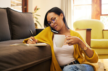 Wall Mural - Woman, phone call or remote work with writing notes, coffee and planning schedule. Couch, mobile discussion and talking female thinking on living room floor, working from home and notebook for agenda