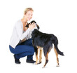© Harsh/peopleimages.com - Love, pets and woman with dog and smile with happiness, pet care and support for border collie. Friends, happy female person and animal in training together isolated on a transparent, png background