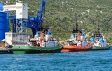 Row of tugboats docked in the port of Ploce in Croatia.