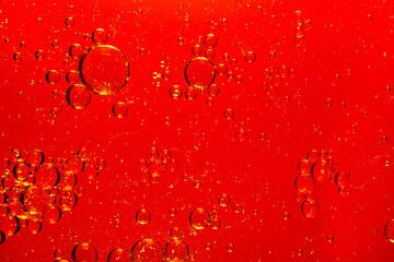 Wall Mural - macro red bubbles,red macro bubbles,Backgrounds, Abstract Backgrounds, Soda, Red, Carbonated,Beauty concept background. Closeup cosmetic liquid gel with bubbles on red colors background