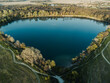 Bird's eye view of the lake and forest. Spring nature. View from a drone