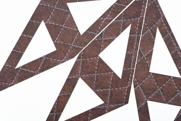 Wall Mural - geometric cut paper shapes with triangles on a white background