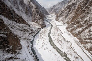 Wall Mural - serene river flowing through a winter wonderland canyon. generative ai