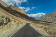 beautiful photo of the road going through the mountains and blue sky at Turtuk village, Nubra Valley, Ladakh, India.