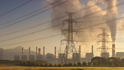 Wall Mural - time lapse video 4k motion. high voltage poles, coal power plant and fog in the morning. mae moh coa