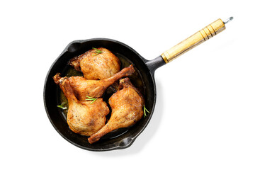 Wall Mural - Freshly roasted duck legs confit in  pan, isolated on white background. top view