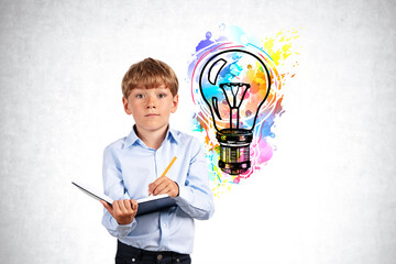 Wall Mural - Boy with notebook and colorful lightbulb