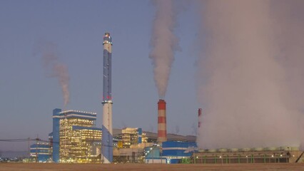 Wall Mural - time lapse video 4k motion. high voltage poles, coal power plant and fog in the morning. mae moh coa