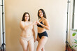 Beautiful young women feeling happy about self love about body diversity